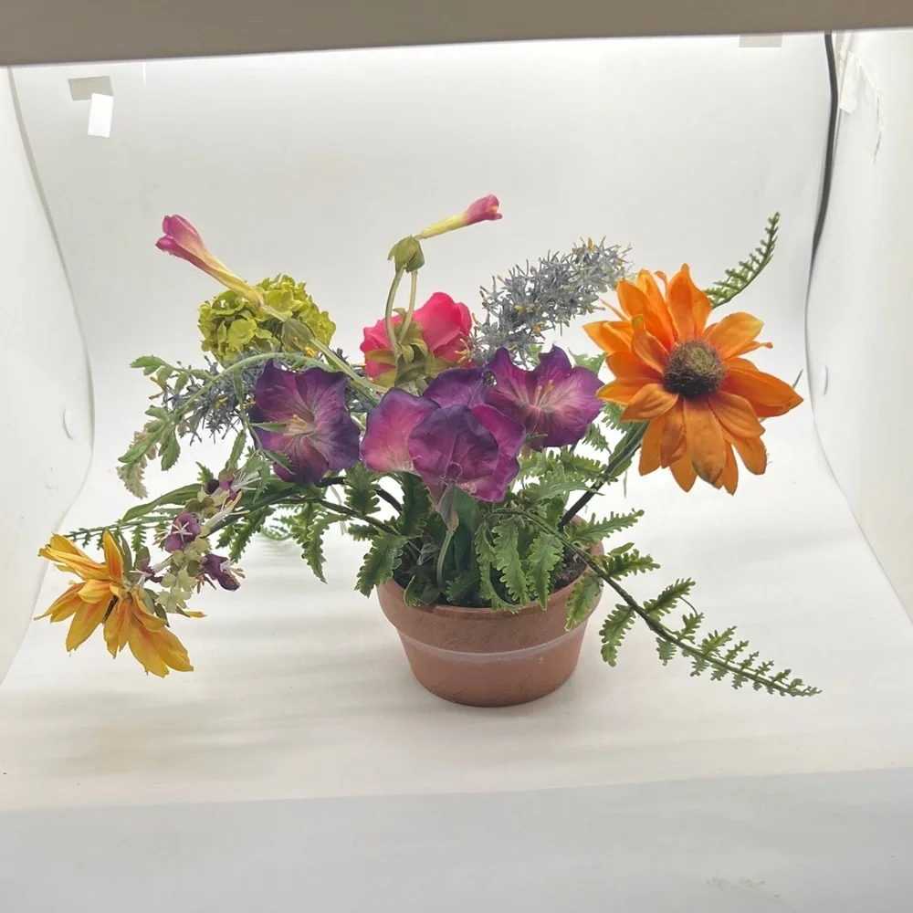 Vibrant Floral Arrangement in Terracotta Pot
